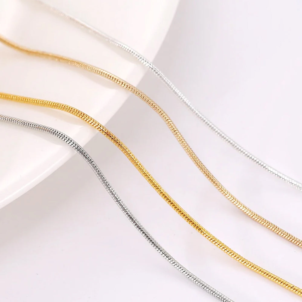 Dainty Snake Chain Necklace crafted from high-quality 925 sterling silver. Classic and versatile design. Adjustable length, available in 18K gold, rose gold or sterling silver