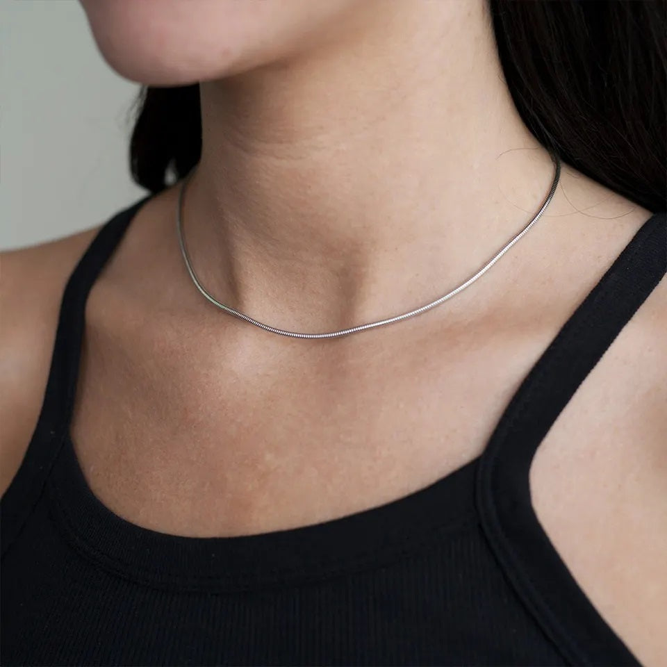 Dainty Snake Chain Necklace crafted from high-quality 925 sterling silver. Classic and versatile design. Adjustable length, available in 18K gold, rose gold or sterling silver